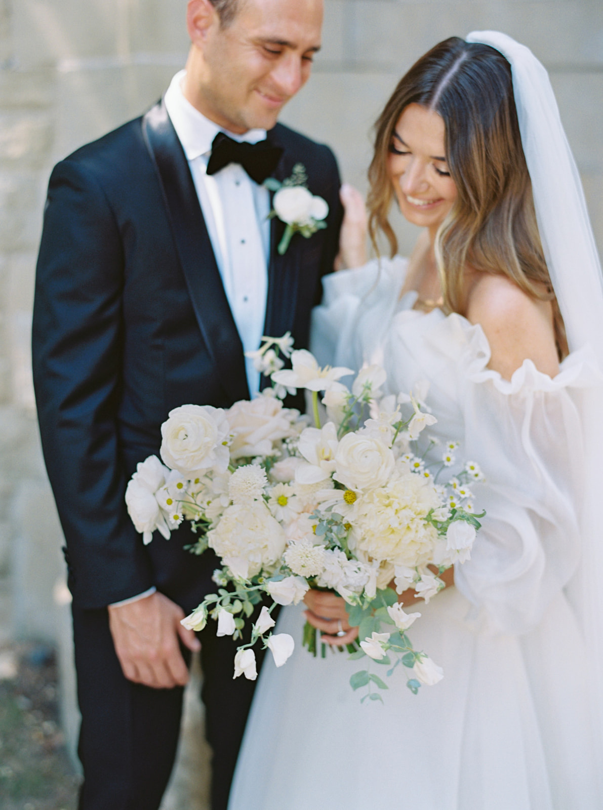Bride & groom with bridal bouquet