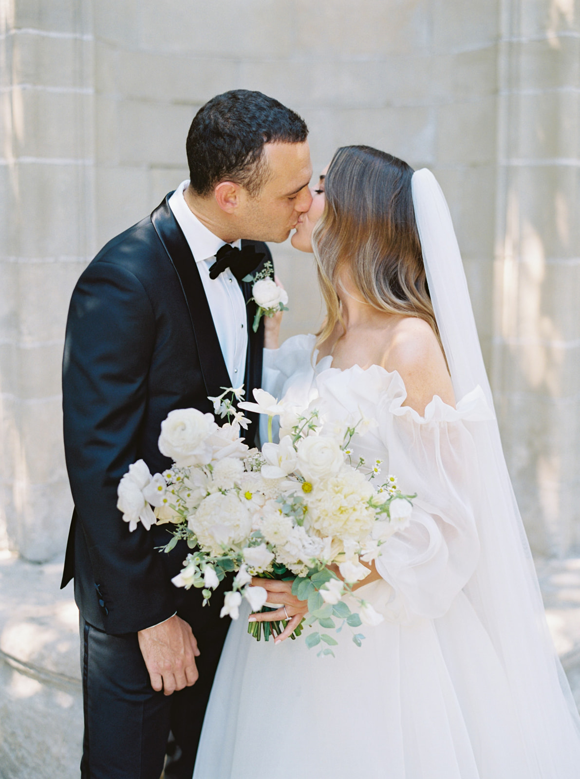 Wedding couple with florals